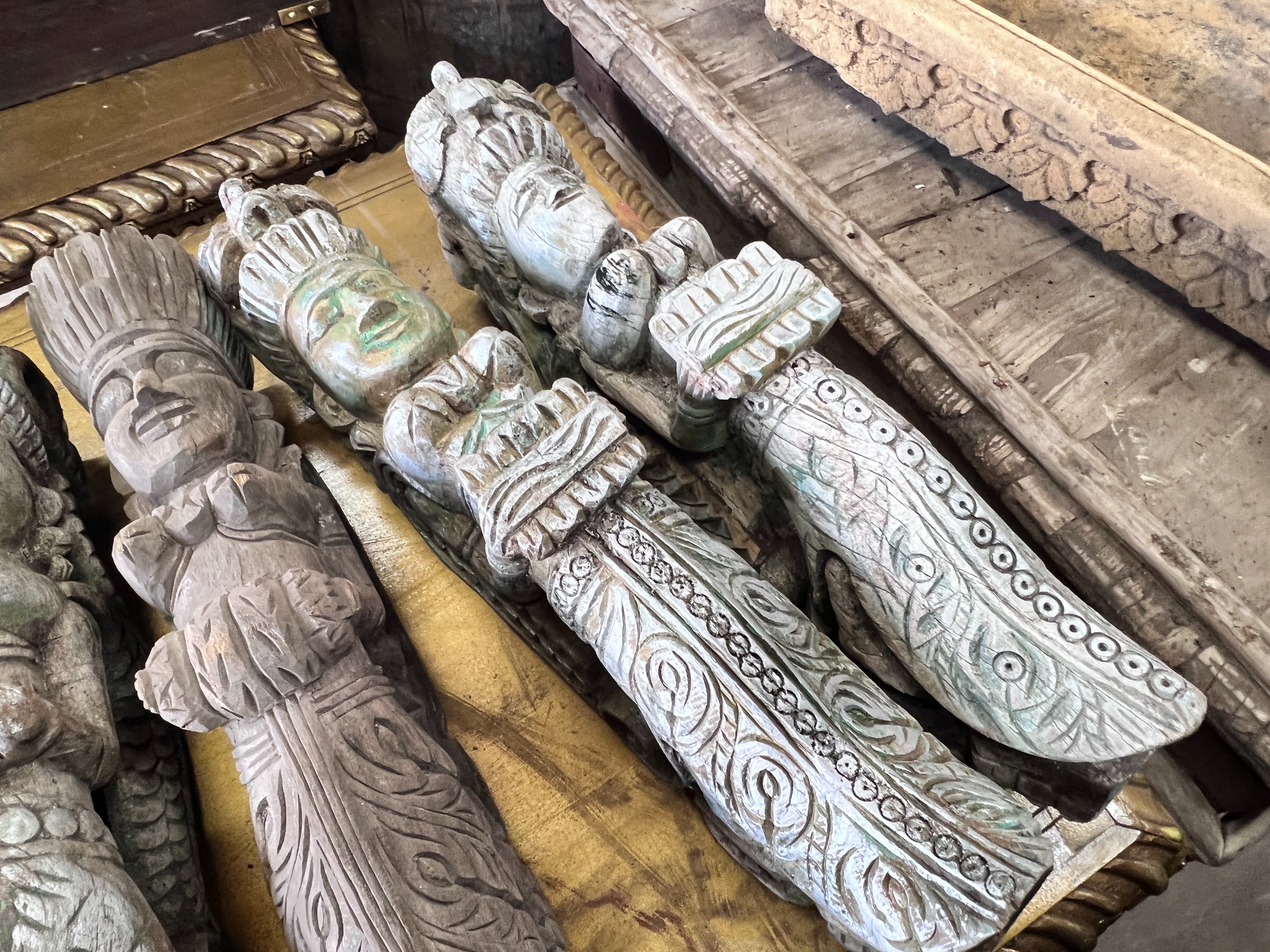 A set of six Indonesian carved hardwood figural appliques, height 60cm